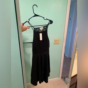 NWT little back adorable black dress for sale! Large.